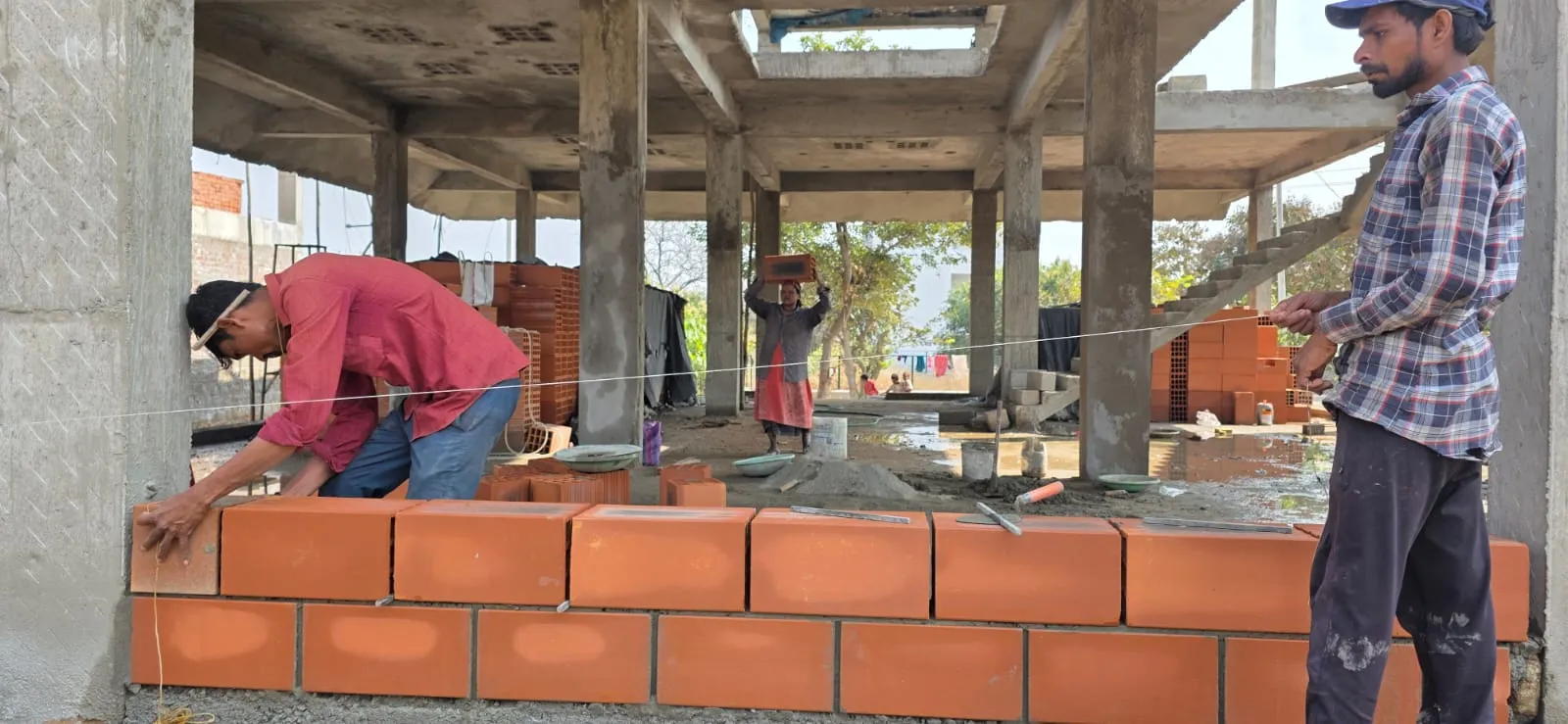 Eco-friendly porotherm block wall under construction